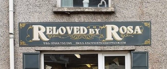 Reloved by Roas logo sign